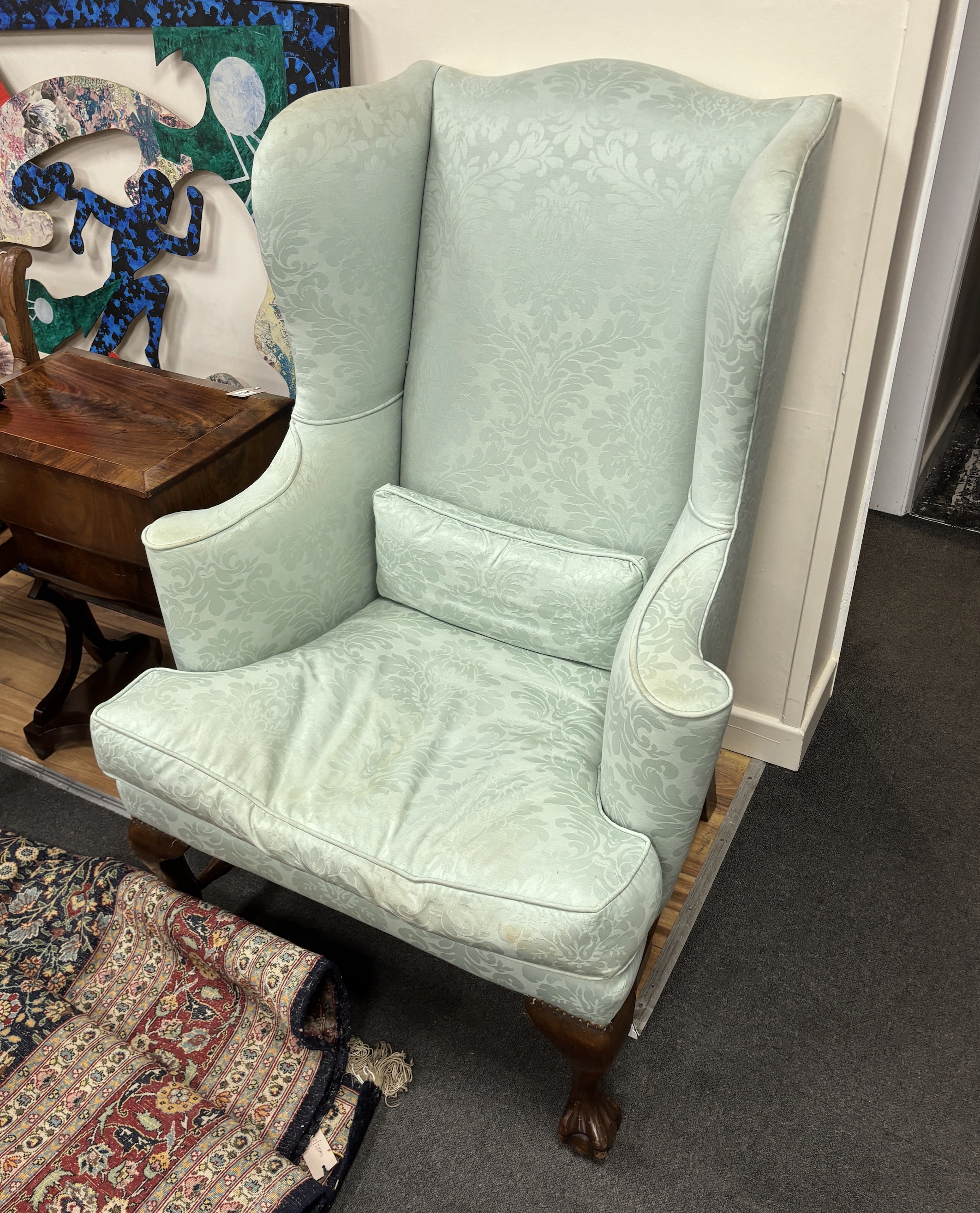 A pair of George I style upholstered wing armchairs, width 85cm, depth 86cm, height 116cm